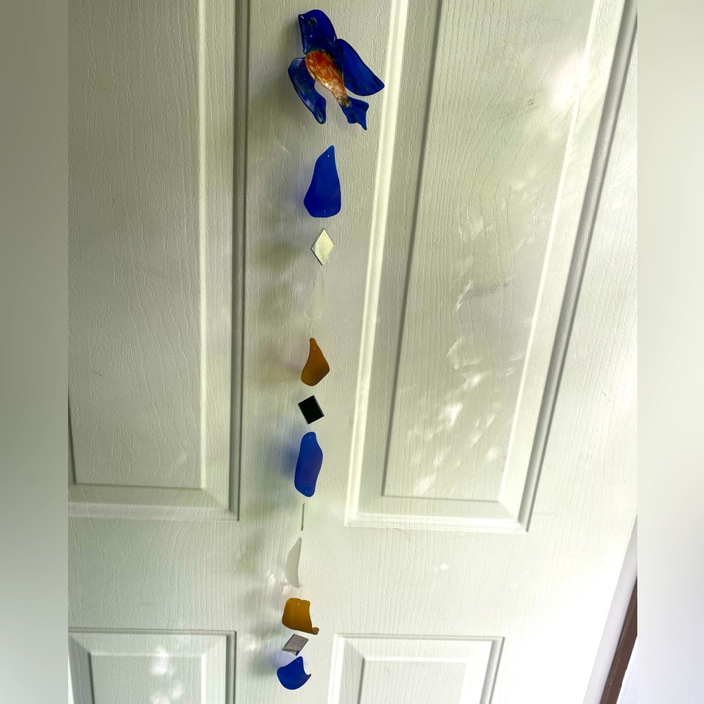 Glass painted blue bird light chime